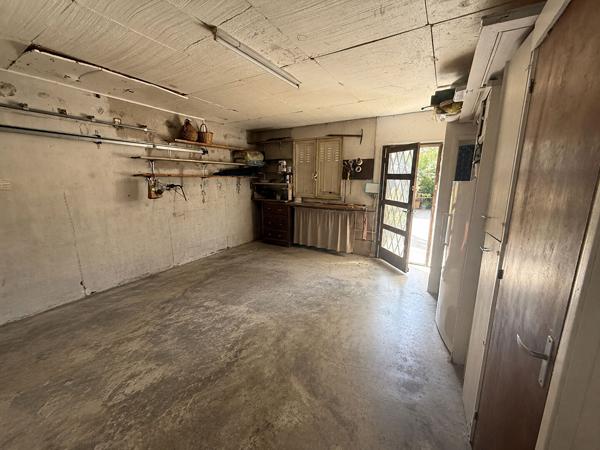 Maison familiale de 105 m² avec 4 chambres, garage motorisé et jardin à Grazailles