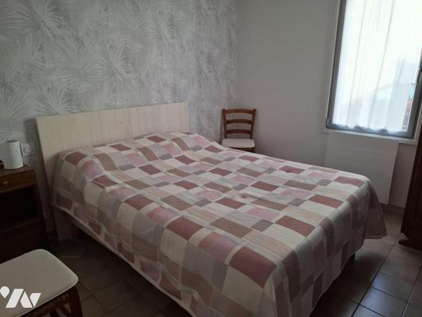 APPARTEMENT 3 CHAMBRES, COUR, CAVE ET GARAGE