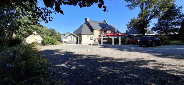 Ensemble immobilier avec restaurant et logement sur un superbe parc arboré