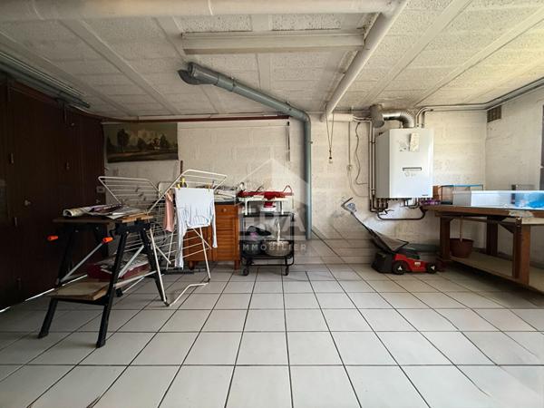 Centre-ville ? Maison avec jardin, véranda et 3 garages