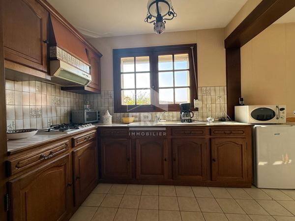 Centre-ville ? Maison avec jardin, véranda et 3 garages