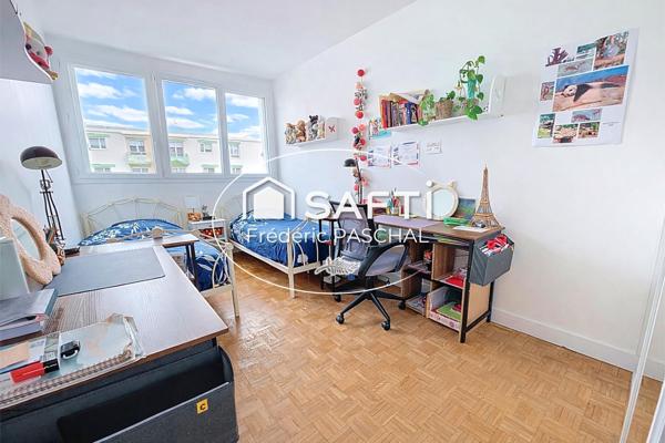 Appartement 3 pièces, 2 chambres - Caves + Parking privatif