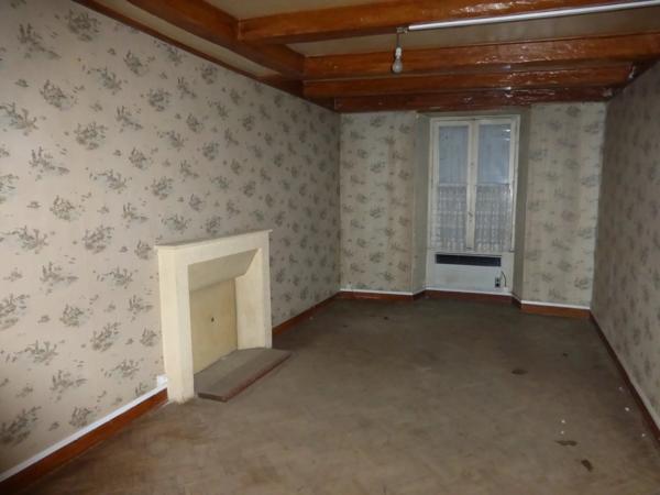 Ancien magasin avec appartement