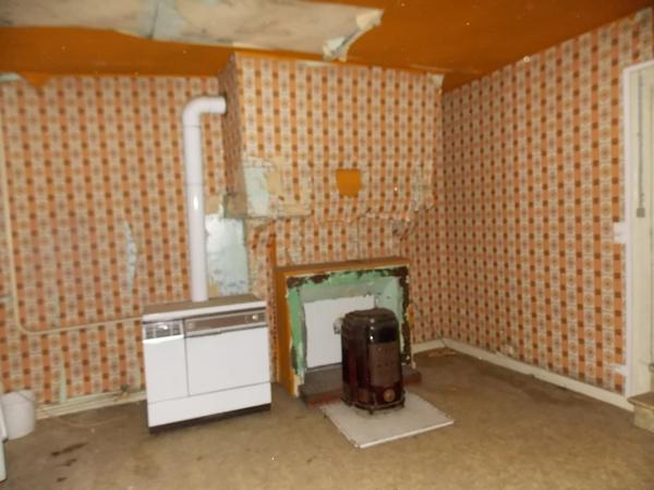 Ancien magasin avec appartement