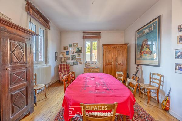 Belle maison de caractère avec jardin, dépendances et grande cave à vins voutée.
