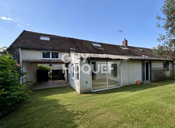 Maison  4 pièces de  130 m2 sur un terrain de 1168m²  avec une grange