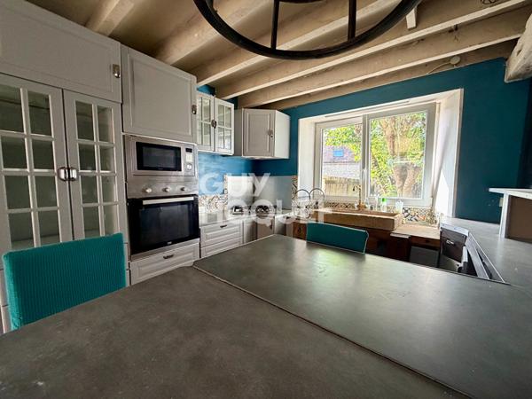 Maison  4 pièces de  130 m2 sur un terrain de 1168m²  avec une grange