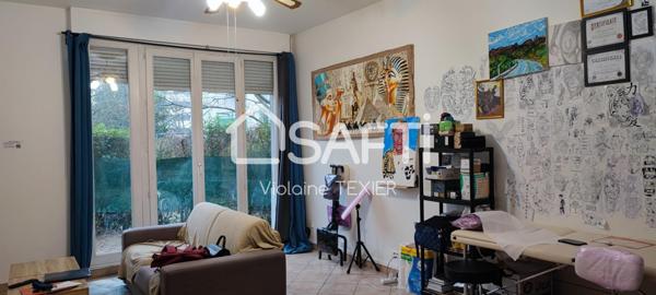 Rdc T2 lumineux en Centre ville avec parking