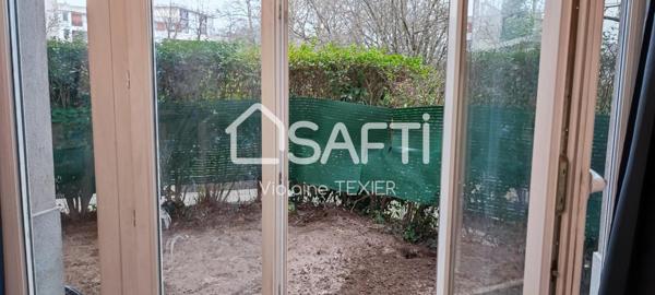 Rdc T2 lumineux en Centre ville avec parking