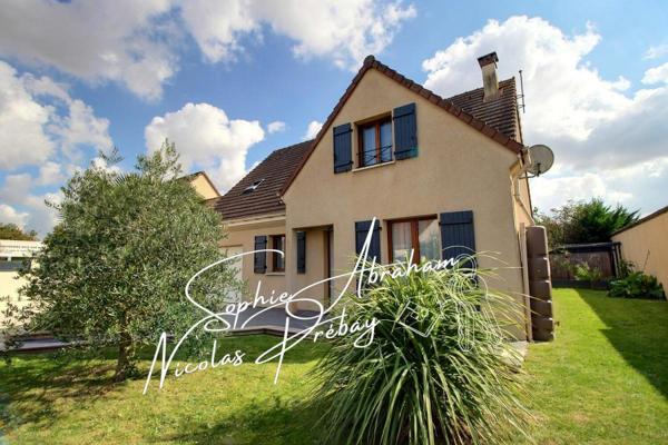 Maison individuelle avec garage et jardin clos