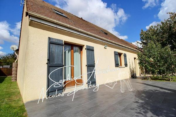 Maison individuelle avec garage et jardin clos