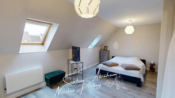 Maison individuelle avec garage et jardin clos