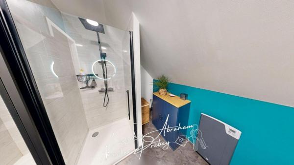 Maison individuelle avec garage et jardin clos