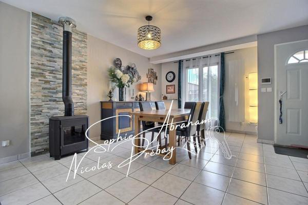 Maison individuelle avec garage et jardin clos