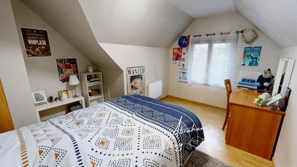 Maison individuelle avec garage et jardin clos