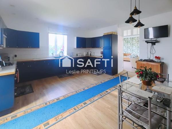 Propriété rénovée avec souplex et jardin