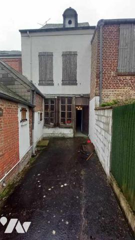 Maison mitoyenne proche centre ville