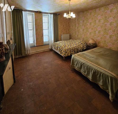 Maison mitoyenne proche centre ville