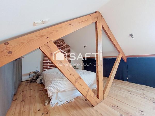 Maison semi-individuelle, avec garage de 50m², à proximité de toutes commodités
