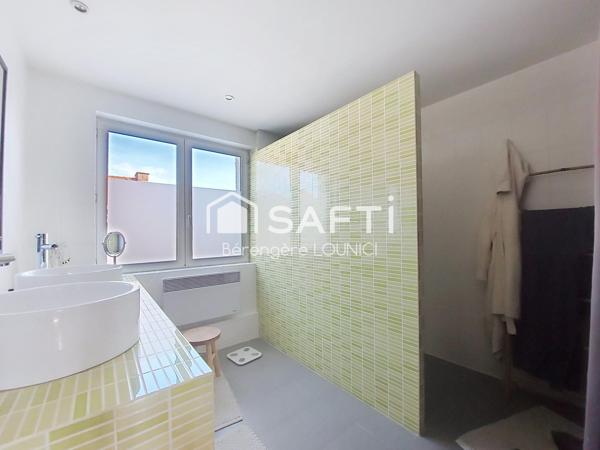 Maison semi-individuelle, avec garage de 50m², à proximité de toutes commodités
