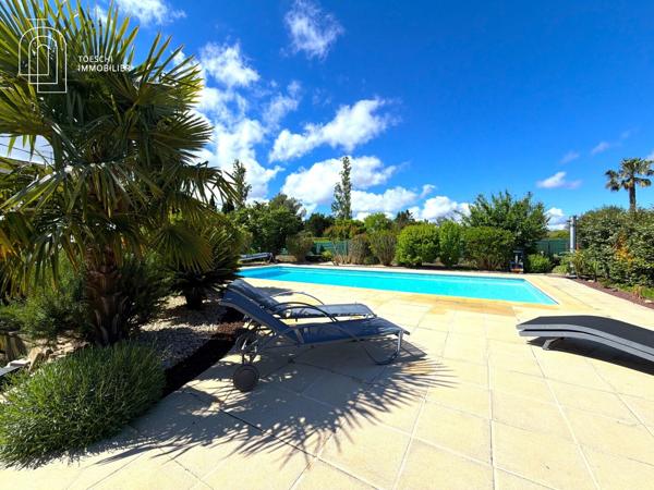 Belle propriété familiale avec piscine et jardin paysager