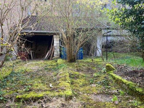 Maison de 112 m2, 3 chambres, garage et terrain.