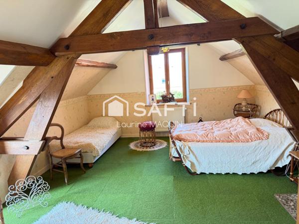 Élégante maison – Charme, volumes et verdure à Bruyères-et-Montbérault