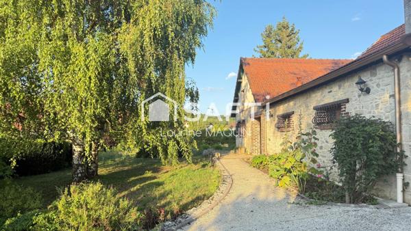Élégante maison – Charme, volumes et verdure à Bruyères-et-Montbérault