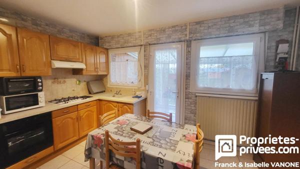 Maison traditionnelle 3 chambres - garage - jardin - cave - 88 m²