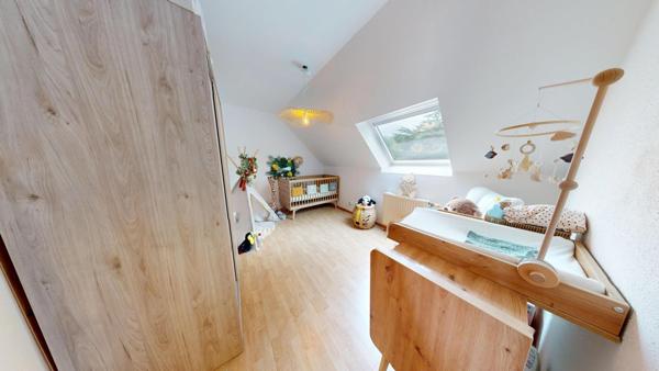 À vendre à Brunstatt : F3 de 77 m² au dernier étage, terrasse 18 m², vue Vosges, garage et ascenseur