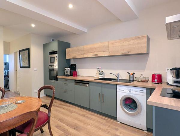 Immeuble Cazères avec local commercial et T3 en duplex