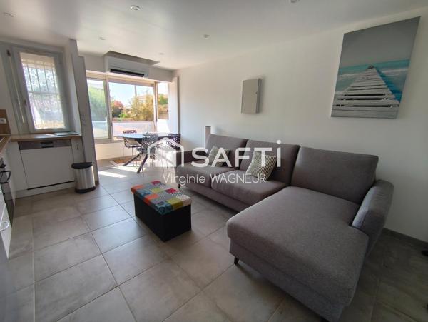 T3 en RDJ avec belle terrasse et parking privé.