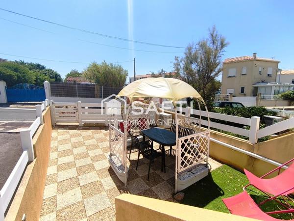 T3 en RDJ avec belle terrasse et parking privé.