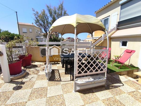 T3 en RDJ avec belle terrasse et parking privé.