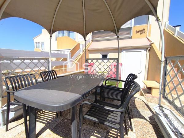 T3 en RDJ avec belle terrasse et parking privé.