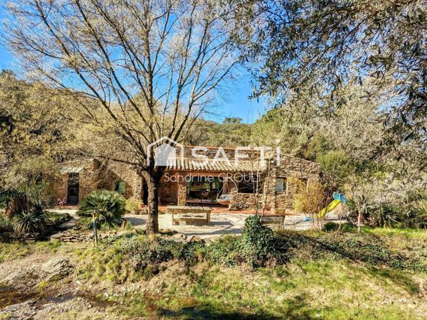 PROPRIETE avec MAS en PIERRE et DEPENDANCES au COEUR DE LA NATURE HERAULTAISE