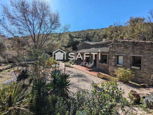 PROPRIETE avec MAS en PIERRE et DEPENDANCES au COEUR DE LA NATURE HERAULTAISE