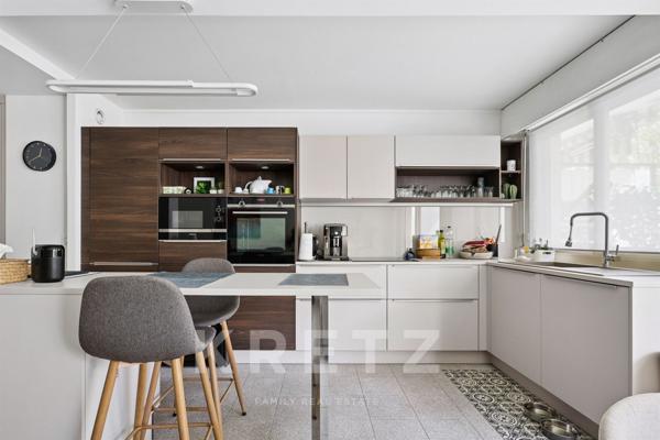 Appartement lumineux entièrement rénové à quelques pas des commerces, des transports et du bois