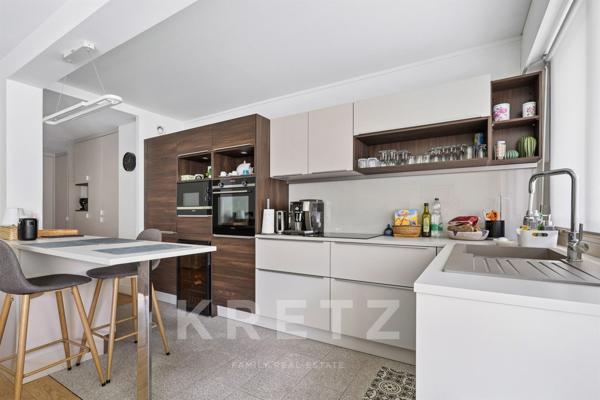 Appartement lumineux entièrement rénové à quelques pas des commerces, des transports et du bois