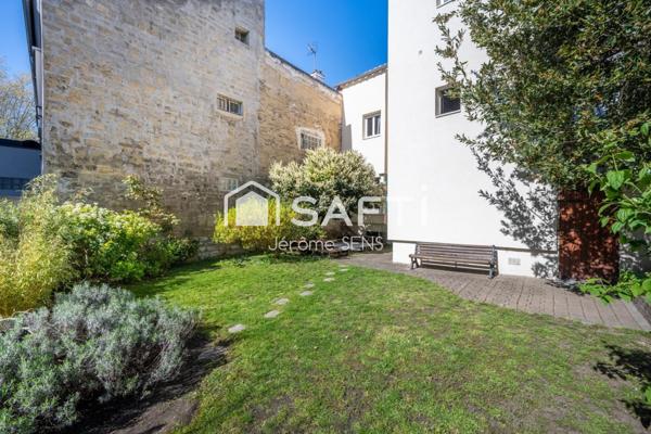 2 pièces rénové avec charme, jardin partagé et cave