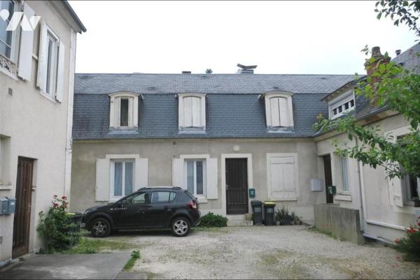 Immeuble de rapport - 6 Appartements - Cour - Parkings - Caves - 444 m² cadastré.