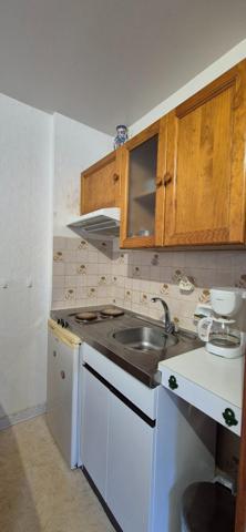 Appartement F1 avec garage, grand balcon exposé sud, potentiel locatif immédiat, rdc.