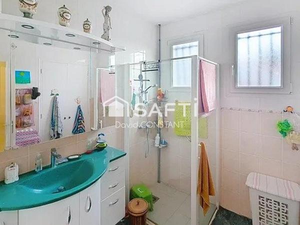 MAISON FAMILIALE EN CENTRE VILLAGE