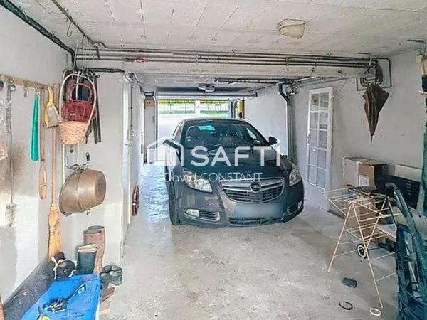 MAISON FAMILIALE EN CENTRE VILLAGE