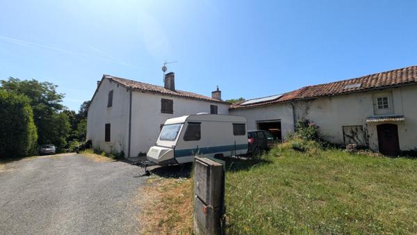 Maison de bourg  avec jardin + dépendances