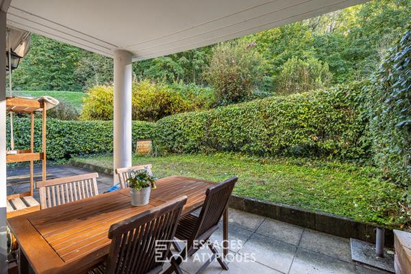 Appartement en rez-de-jardin avec terrasse à Caluire