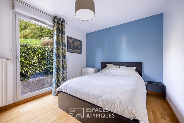 Appartement en rez-de-jardin avec terrasse à Caluire