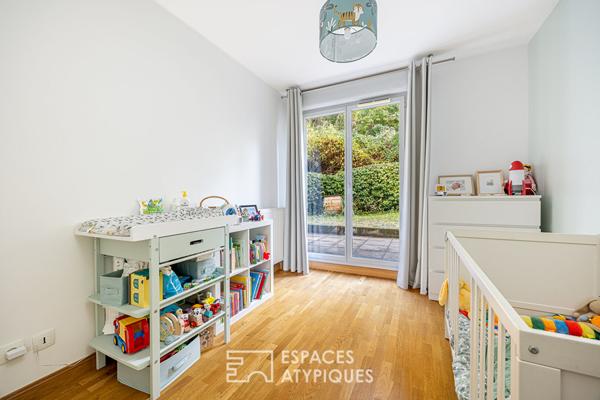 Appartement en rez-de-jardin avec terrasse à Caluire