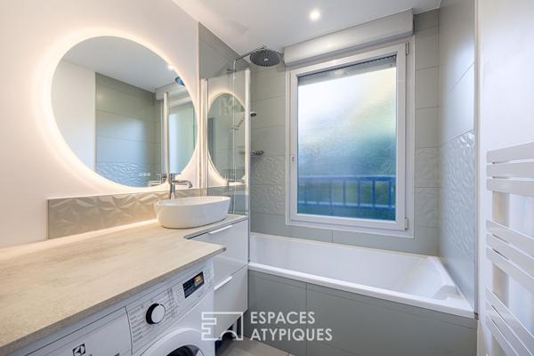 Appartement en rez-de-jardin avec terrasse à Caluire