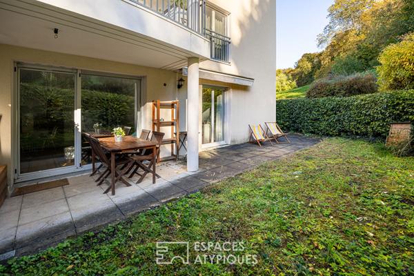 Appartement en rez-de-jardin avec terrasse à Caluire